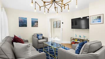 TV connectée, livres, espaces bureaux