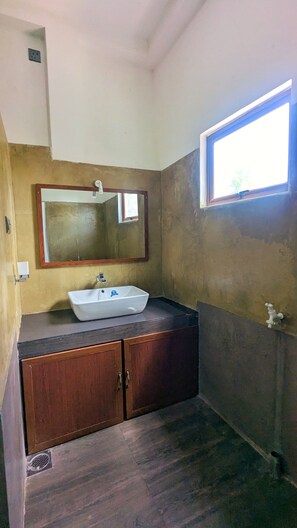 Shower, hair dryer, towels, toilet paper