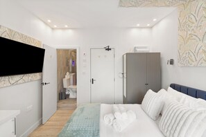 1 chambre, fer et planche à repasser, Wi-Fi gratuit, draps fournis