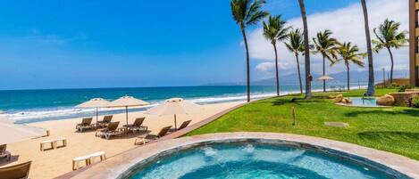On the beach, sun-loungers, beach towels