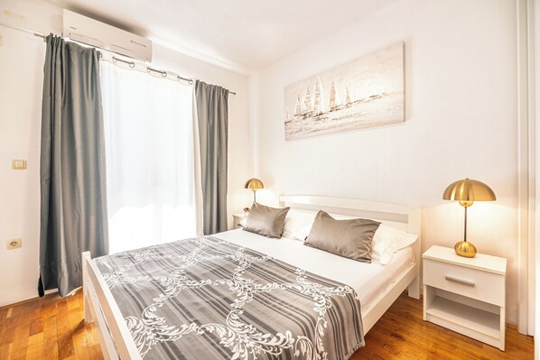 1 bedroom, desk, iron/ironing board, travel crib