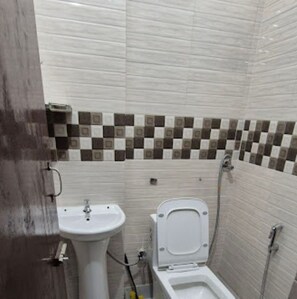 Ducha, bidé, toallas y jabón