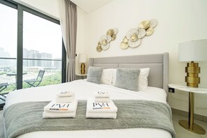 Luxury Apartment, Balcony, City View | Down comforters, in-room safe, blackout drapes, soundproofing