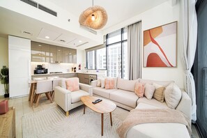 Executive Apartment, Balcony, City View | Living room | 40-inch Smart TV with digital channels - PVH - Stylish 1BR - Azizi Riviera (Dubai)