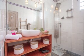 Shower, hair dryer, towels, soap