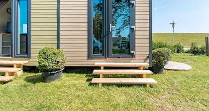 Tiny Home 'Surfbrett Am Deich' mit Gemeinschaftsgarten und WLAN