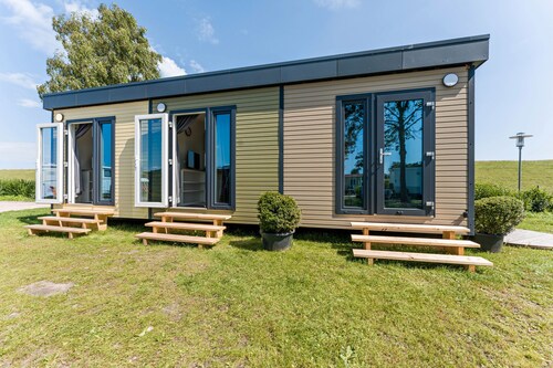 Tiny Home 'Surfbrett Am Deich' with Shared Garden and Wi-Fi