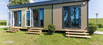 Tiny Home 'Surfbrett Am Deich' with Shared Garden and Wi-Fi