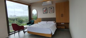 In-room safe, desk, laptop workspace, soundproofing - PubliQ Luxury Stays (Hyderabad)