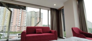 In-room safe, desk, laptop workspace, soundproofing - PubliQ Luxury Stays (Hyderabad)