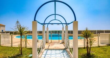 Maison dans résidence avec piscine et accÚs direct à la plage