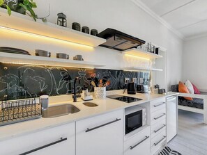 Microwave, toaster, cookware/dishes/utensils