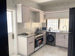 Fridge, microwave, stovetop, electric kettle