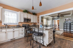 Fridge, microwave, stovetop, coffee/tea maker