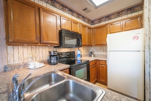 Suite, uitzicht op resort | Privékeuken