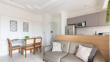 Basic Apartment | Living area | Flat-screen TV