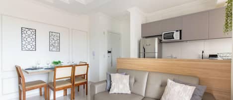 Basic Apartment | Living area | Flat-screen TV