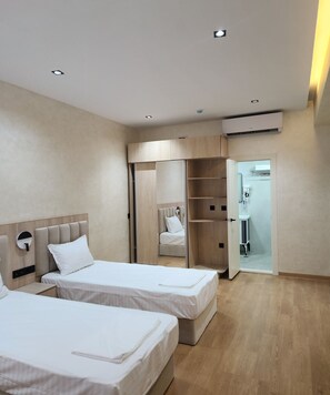 Classic Triple Room | In-room safe, desk, laptop workspace, blackout curtains - HORIZON HOTEL (Tashkent)