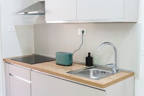 Fridge, stovetop, cookware/dishes/utensils