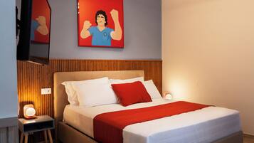 Deluxe Room, 1 Queen Bed | In-room safe, desk, laptop workspace, iron/ironing board