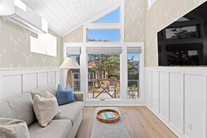 TV, fireplace, books, stereo