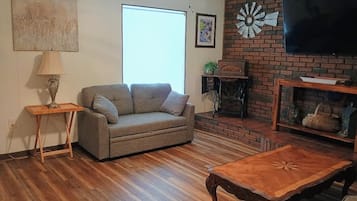 Family Apartment, Mountain View | Living area | 60-inch Smart TV with digital channels