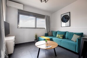 Apartment, 1 Bedroom, Kitchen, City View | Living room | 43-inch Smart TV with digital channels, streaming services