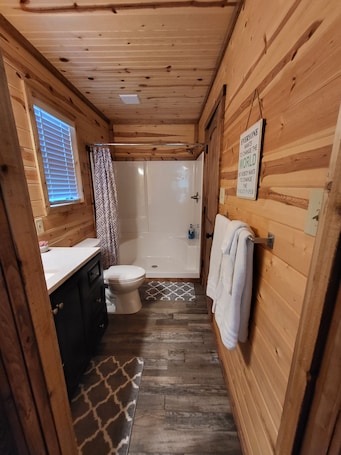 Shower, hair dryer, towels, soap. Cozy Lakefront 2-bedroom cabin in tranquil Big Sandy, TX.