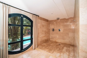 Studio Suite, 1 King Bed, Balcony, Mezzanine | Bathroom | Free toiletries, hair dryer, bathrobes, slippers
