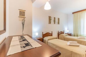 2 chambres, fer et planche à repasser, accès au Wi-Fi (inclus)