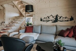 Luxury Chalet, Mountain View | Living area | 65-inch LED TV with satellite channels, Netflix, DVD player