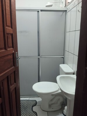 Shower, towels, soap, toilet paper