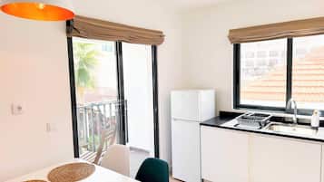 Apartment, 1 Bedroom, Balcony | Private kitchenette | Fridge, microwave, oven, stovetop