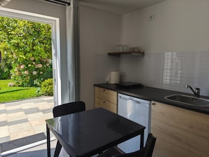 Fridge, coffee/tea maker, electric kettle, toaster