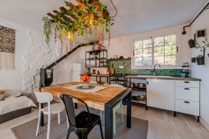 Fridge, stovetop, coffee/tea maker, cookware/dishes/utensils