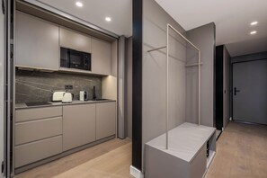 スタジオ | 専用キッチン | 小型冷蔵庫、電子レンジ、コンロ、エスプレッソマシン