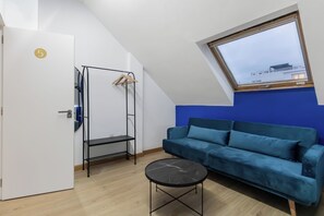 Twin Room, City View | Living area