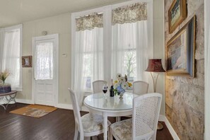 House, Multiple Beds, Patio, City View (101 N Orange #2) | Dining - Charming Balcony Suite Overlooking Main Street-walk to Everything! (Fredericksburg)