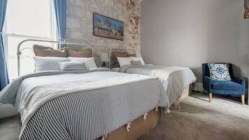 2 bedrooms, individually decorated, individually furnished, bed sheets