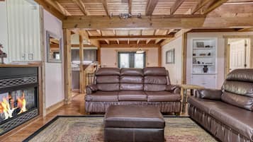 Room, Multiple Beds, Patio, Pool View (Campfire Lodge) | Living area | TV
