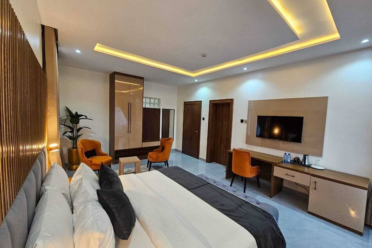 Luxury Suite, Balcony, Courtyard View | Desk, laptop workspace, free WiFi