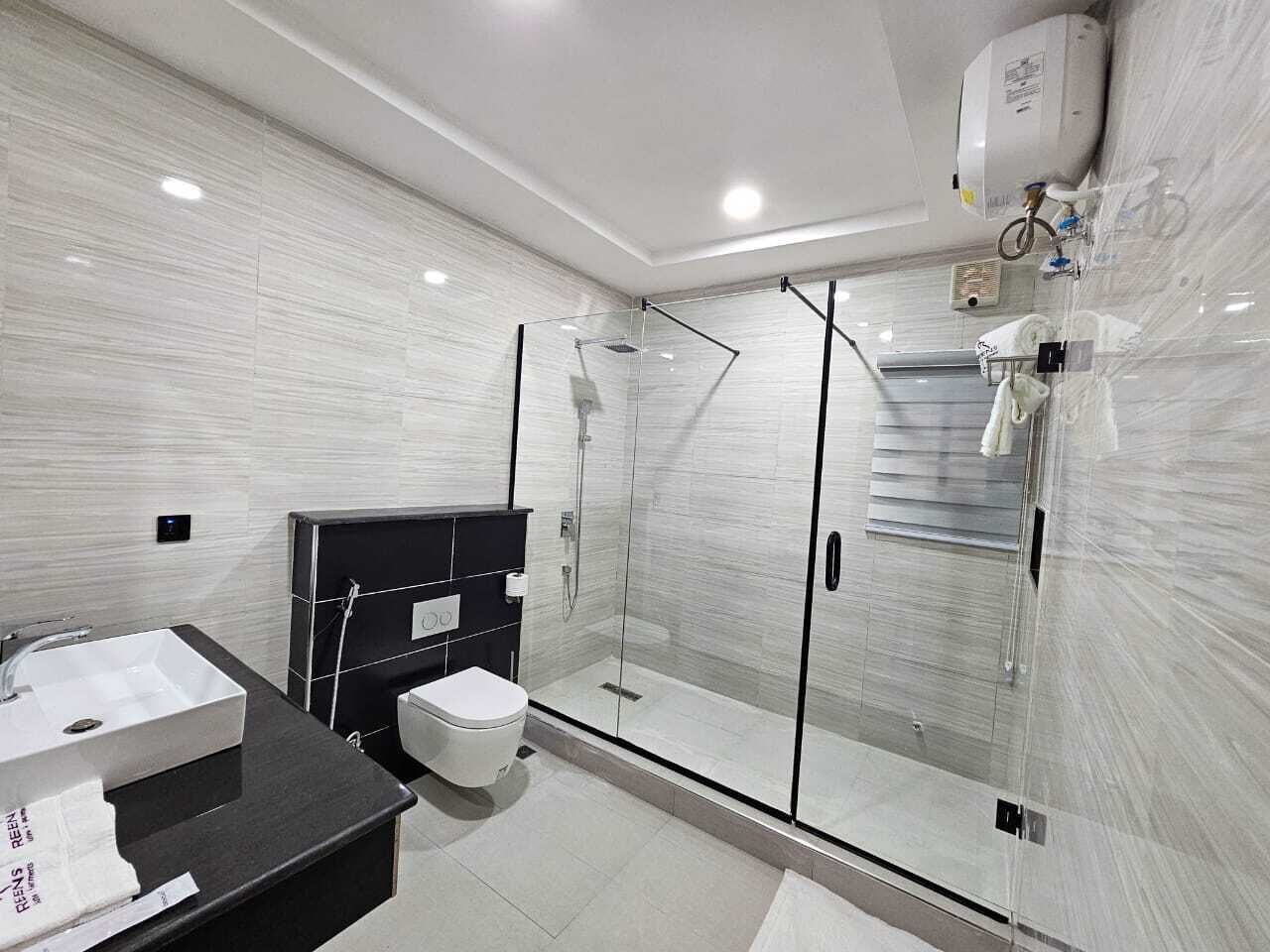 Shower, slippers, towels, soap