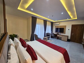 Superior Suite, Balcony, Courtyard View | Desk, laptop workspace, free WiFi