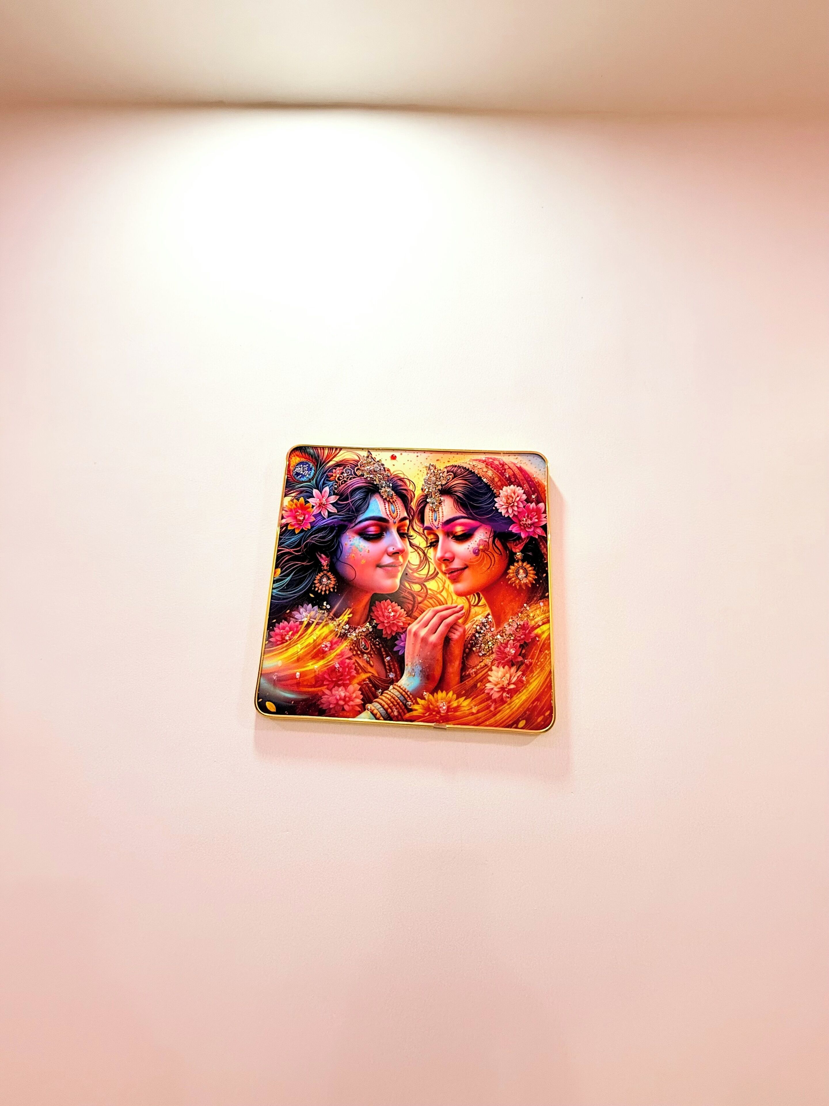 A square object with a colorful design on a plain background.