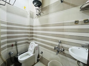 Shower, slippers, towels, soap