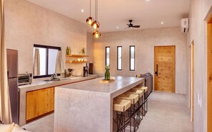 Microwave, stovetop, coffee/tea maker, cookware/dishes/utensils