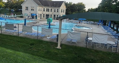 Resort studio apartment with private hot tub, fire pit, gym, and access to pool.