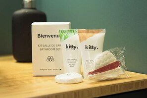 Hair dryer, towels, soap, toilet paper