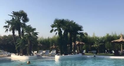 Bed and Breakfast Loggia degli Artisti 'Deluxe Room One' with shared pool and air conditioning