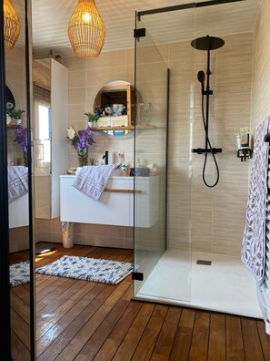 Shower, hair dryer, towels, soap